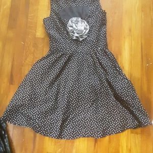 A Black dress with polka dots